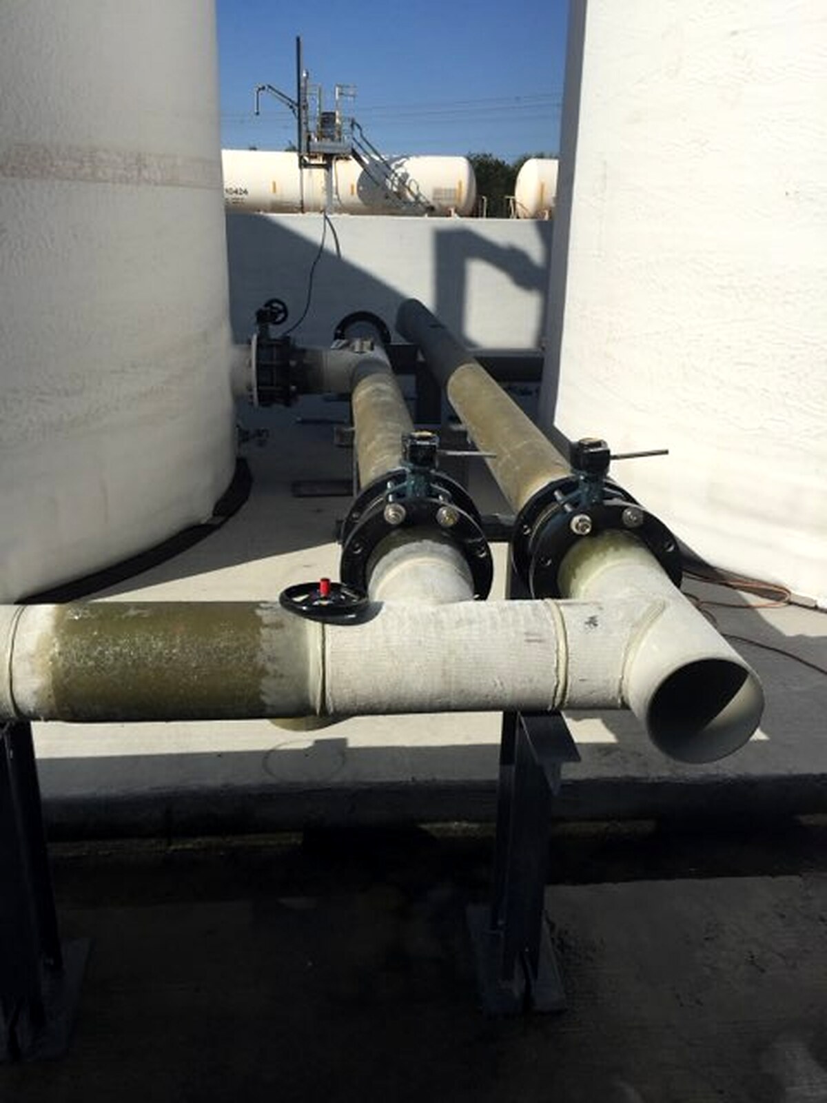 FRP piping and valves connecting fiberglass tanks