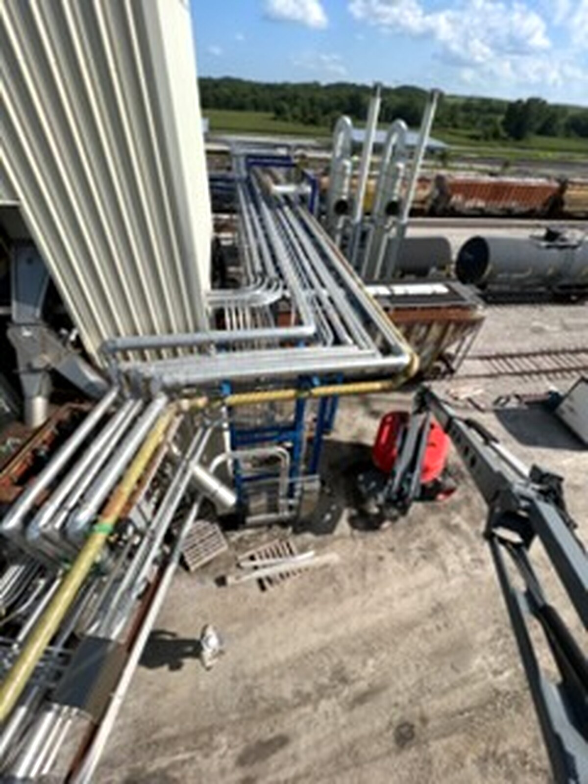 Pipe rack installation at an outdoor industrial facility